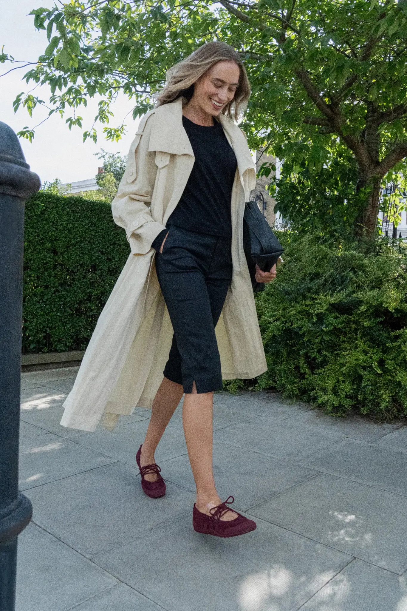 Model in Hybrid Mary Janes enjoying off-duty plans outdoors