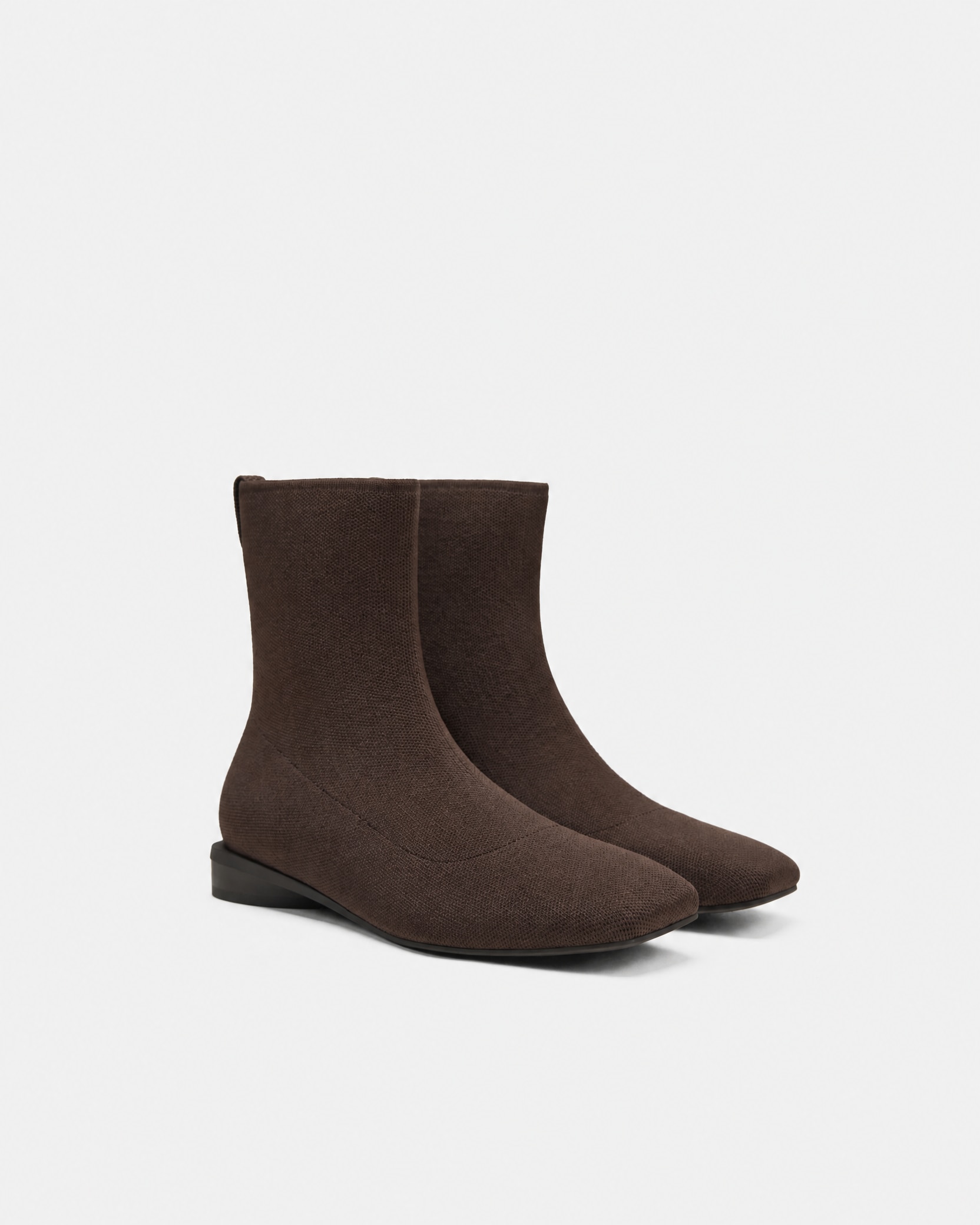 Dark Chocolate square-toe ankle boots on a light background