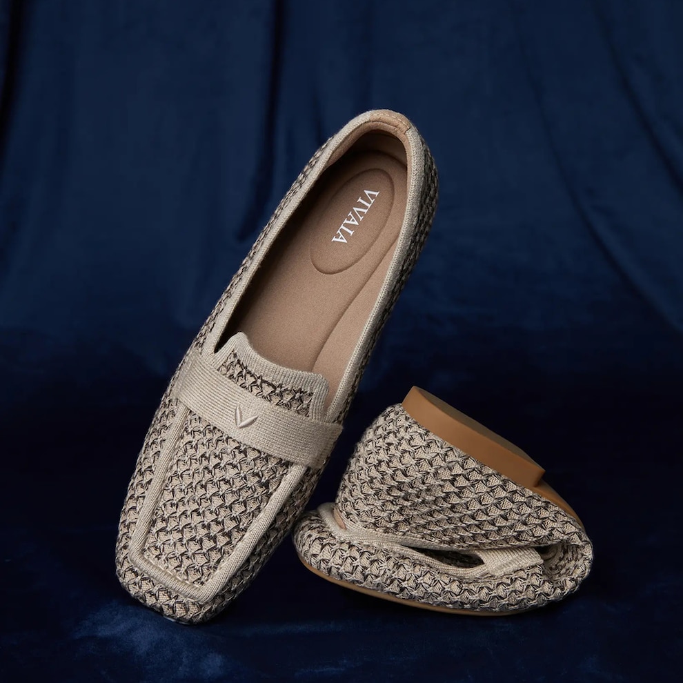 Soft VIVAIA loafers folded for packing
