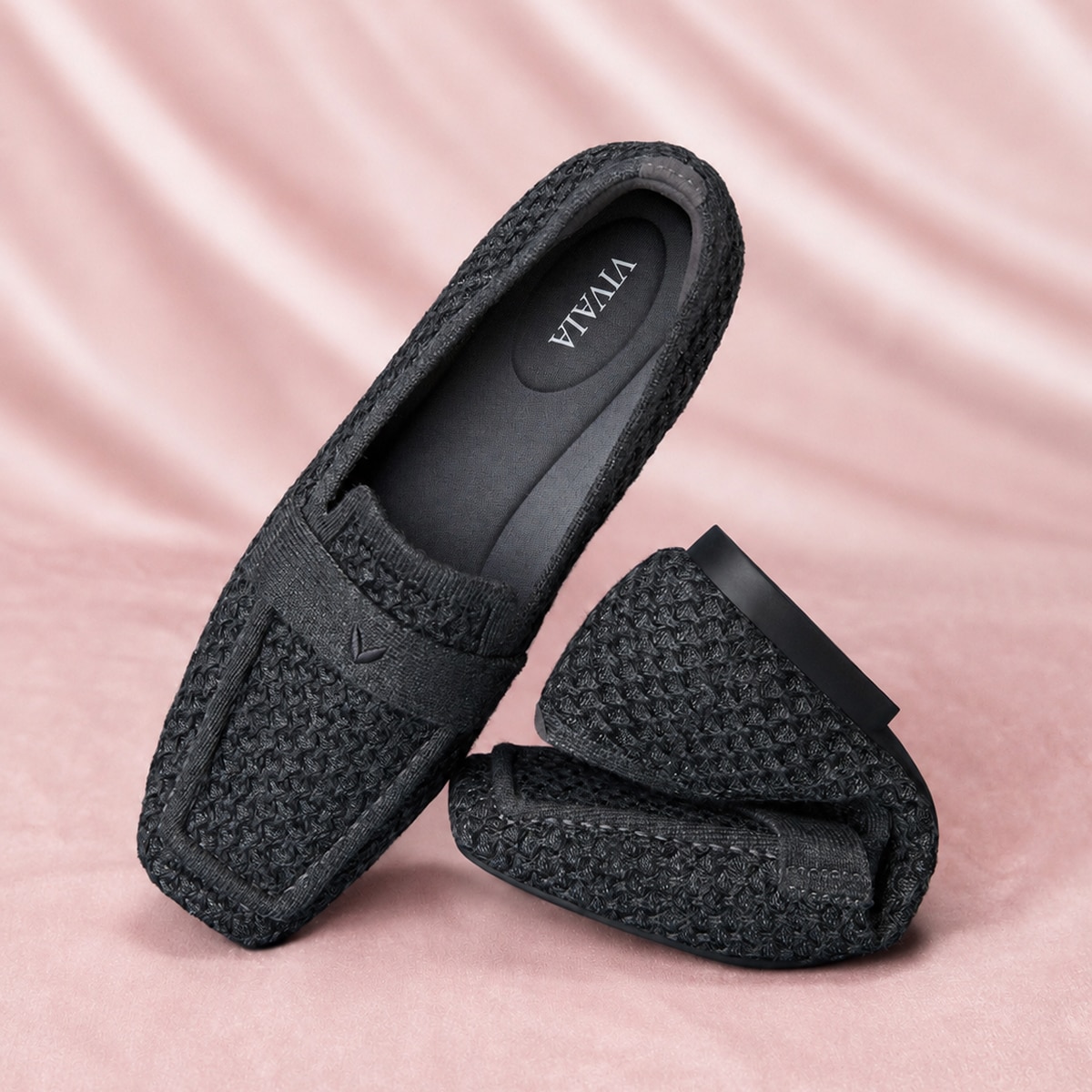 Soft VIVAIA loafers folded for packing