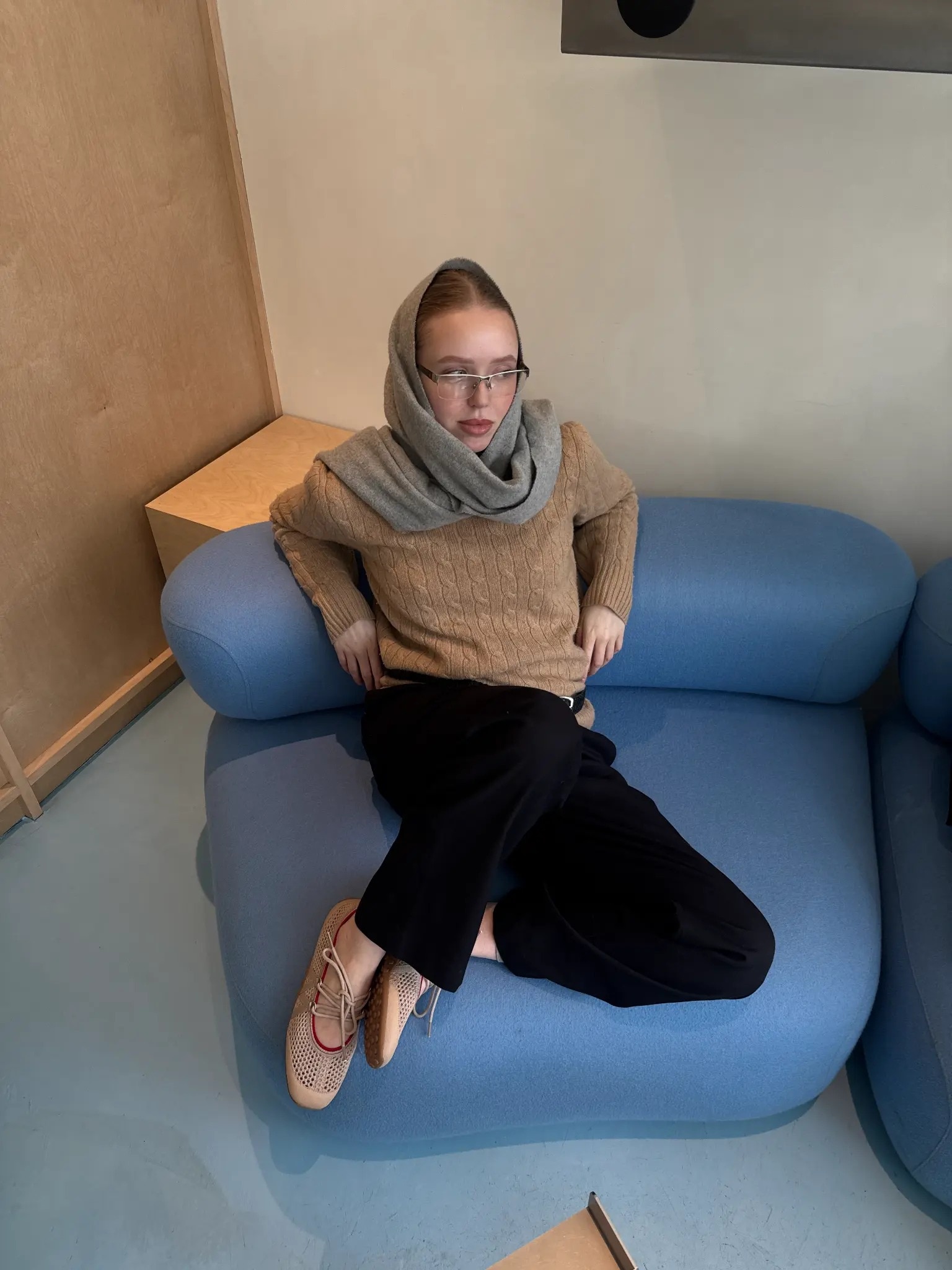 KOL wearing almond Hybrid Mesh Mary Janes on blue sofa