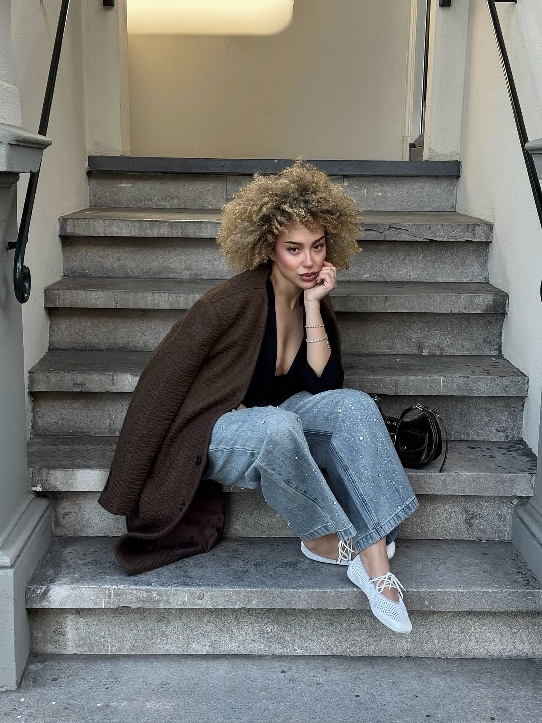 KOL wearing white Hybrid Mesh Mary Janes on stairs