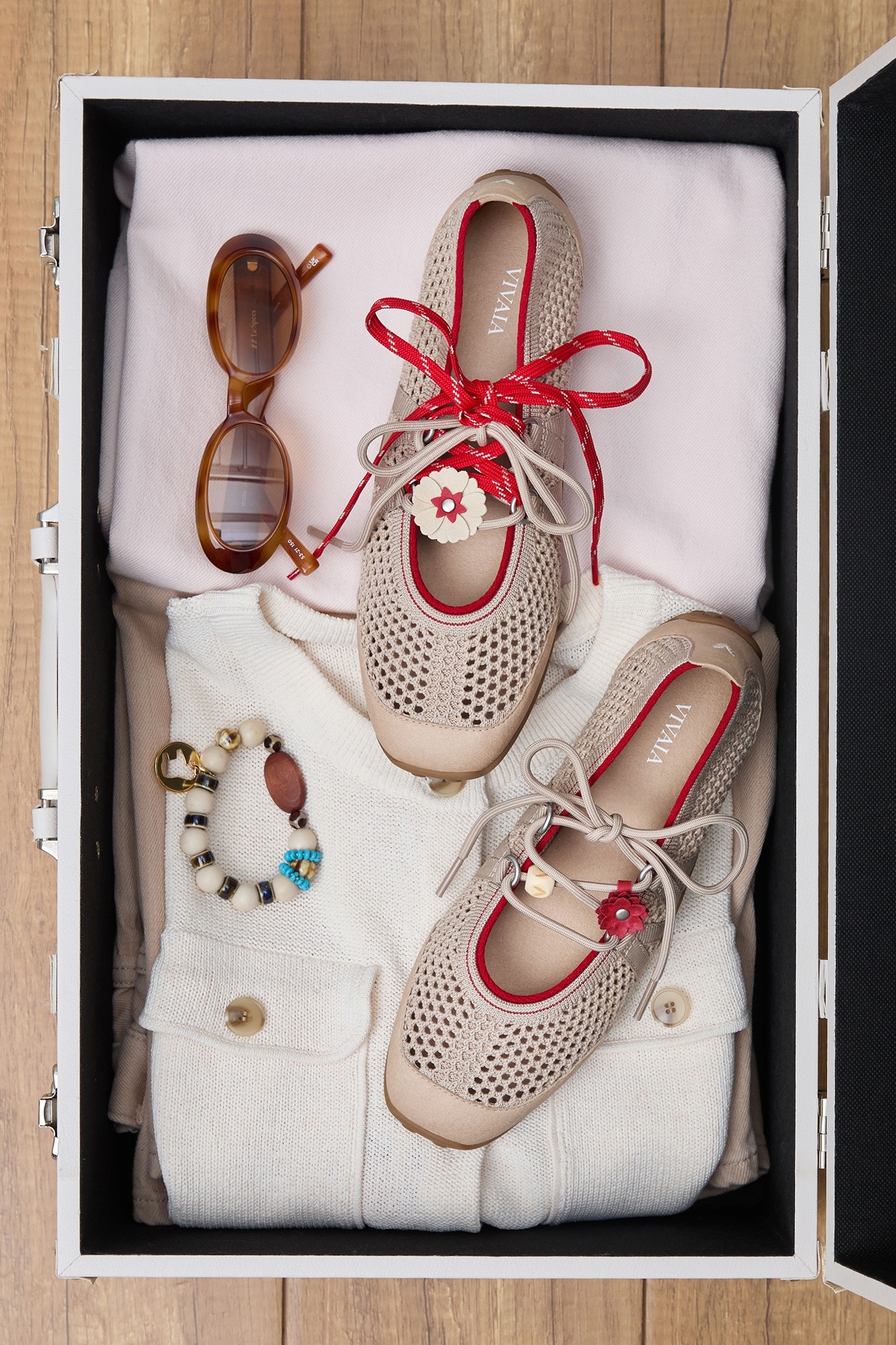 Hybrid Mesh Mary Janes — Almond with red laces in suitcase