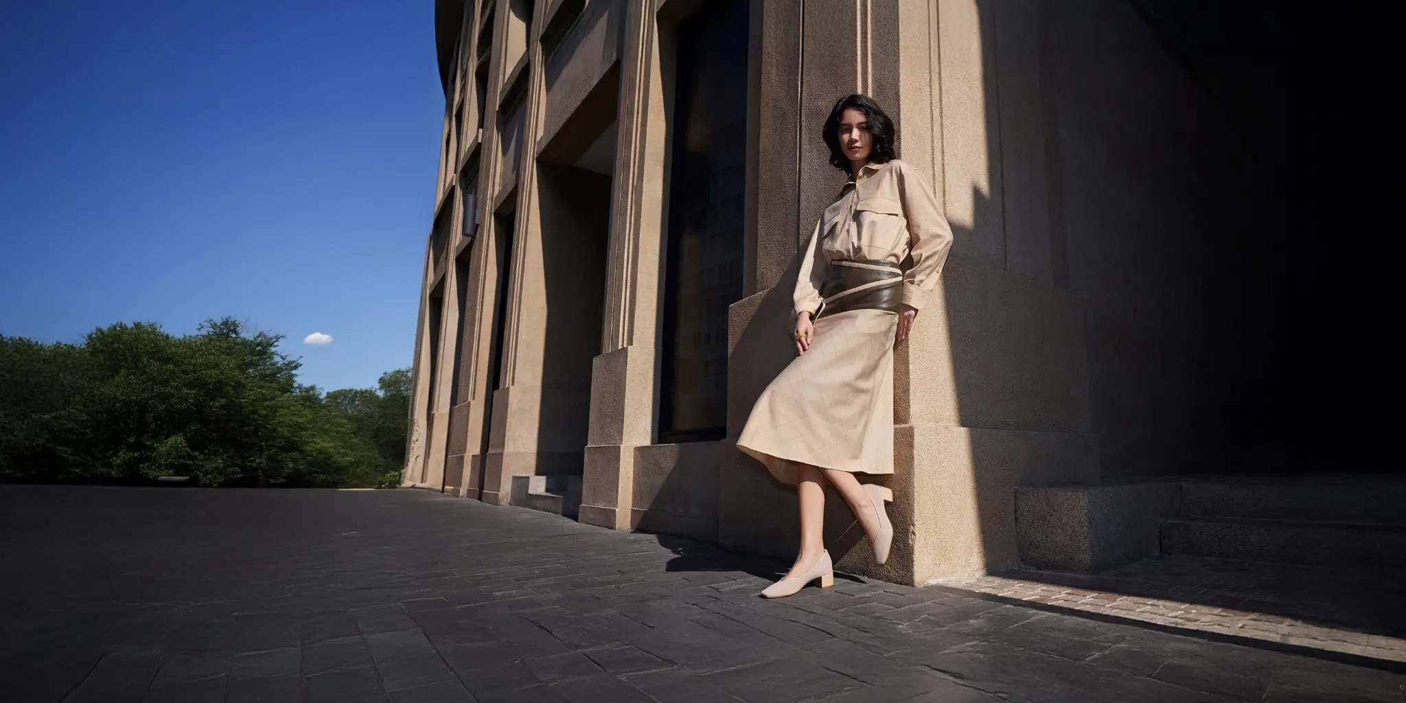 Model wearing VIVAIA Megan heels in front of building