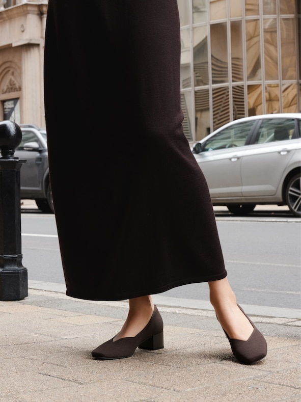 Megan heels in commute scene