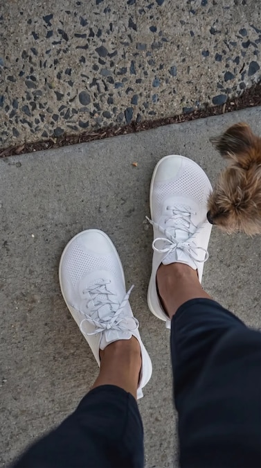Customer Sara wearing Maven from work to evening dog walks