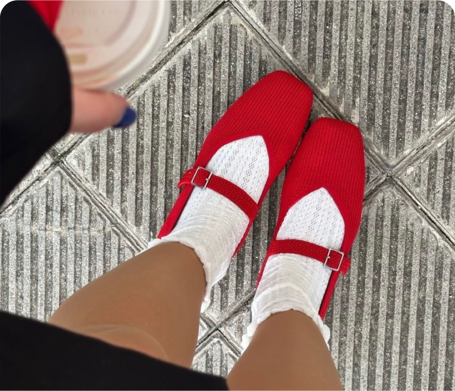 Joann G. wearing Margot red