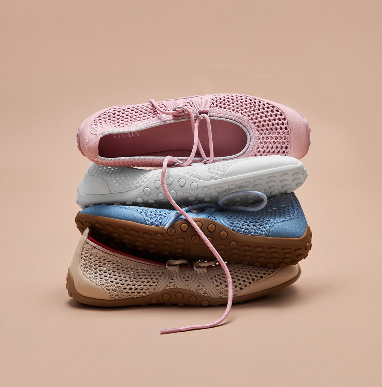 Cecily stacked shoes showing breathable mesh in multiple colors