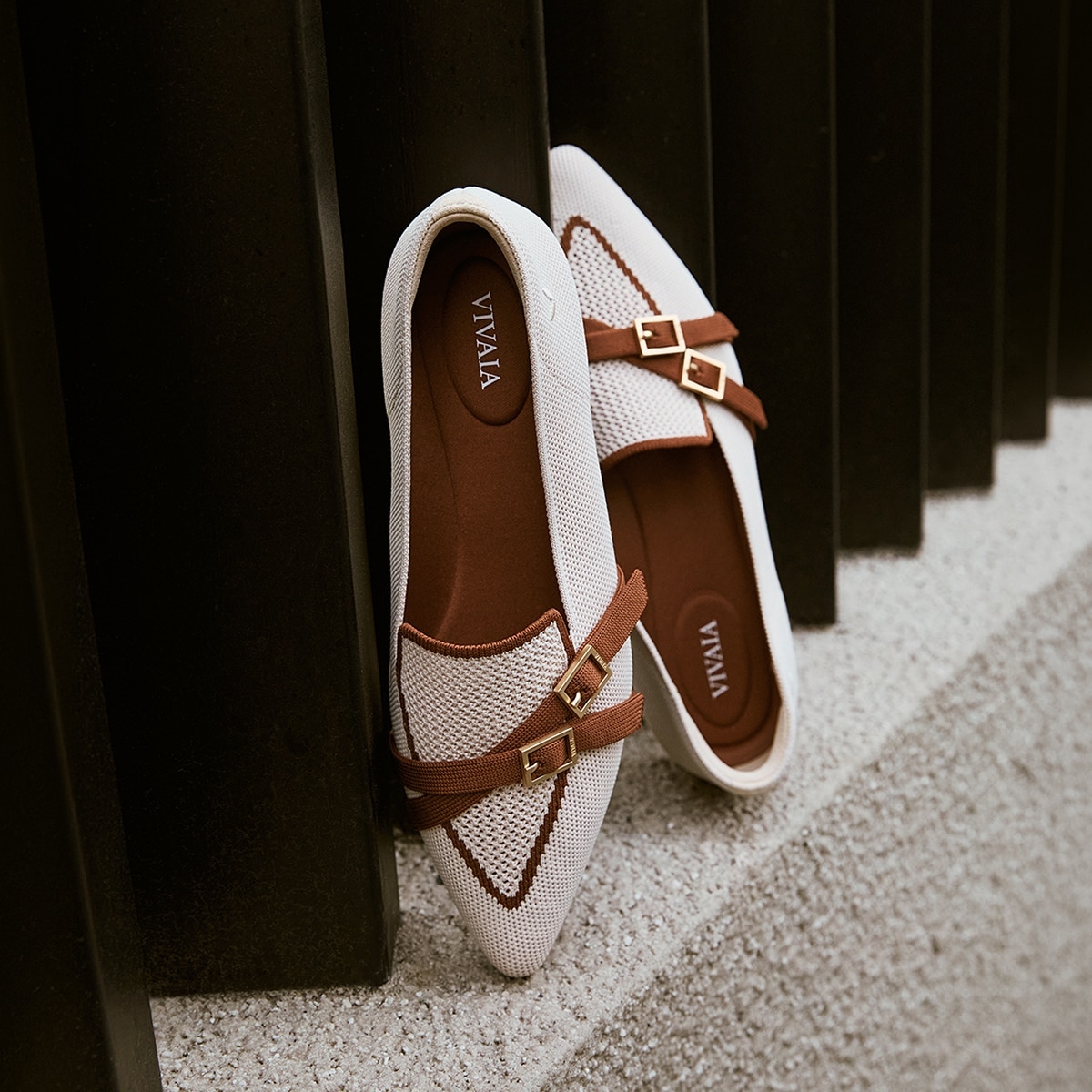 VIVAIA loafer beside neatly folded knitwear, showing the easy-care recycled-knit upper