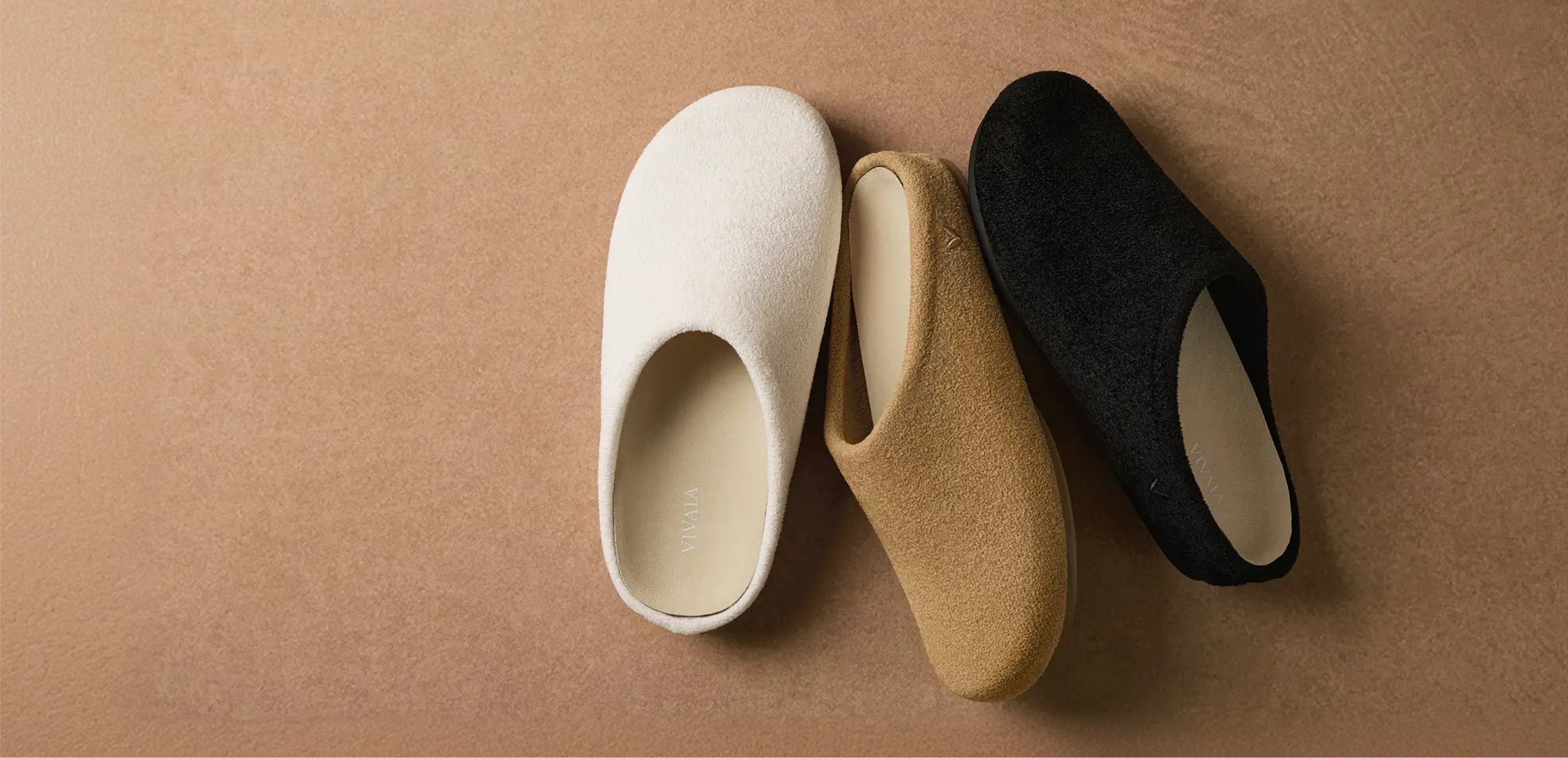 VIVAIA Round-Toe Clog Mules in white, tan, and black