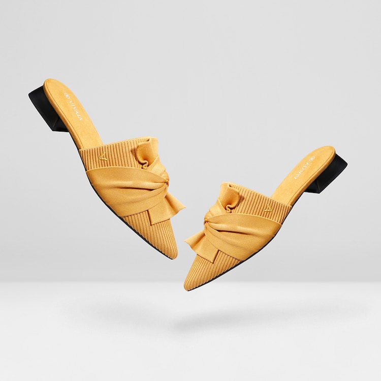 Yaffa Pointed-Toe Knot Sustainable Mules in Mustard Yellow | VIVAIA