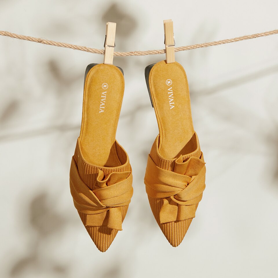 Yaffa Pointed-Toe Knot Sustainable Mules in Mustard Yellow | VIVAIA