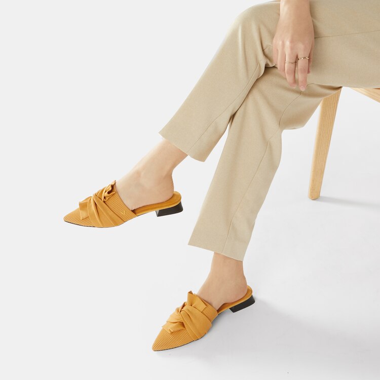 Yaffa Pointed-Toe Knot Sustainable Mules in Mustard Yellow | VIVAIA