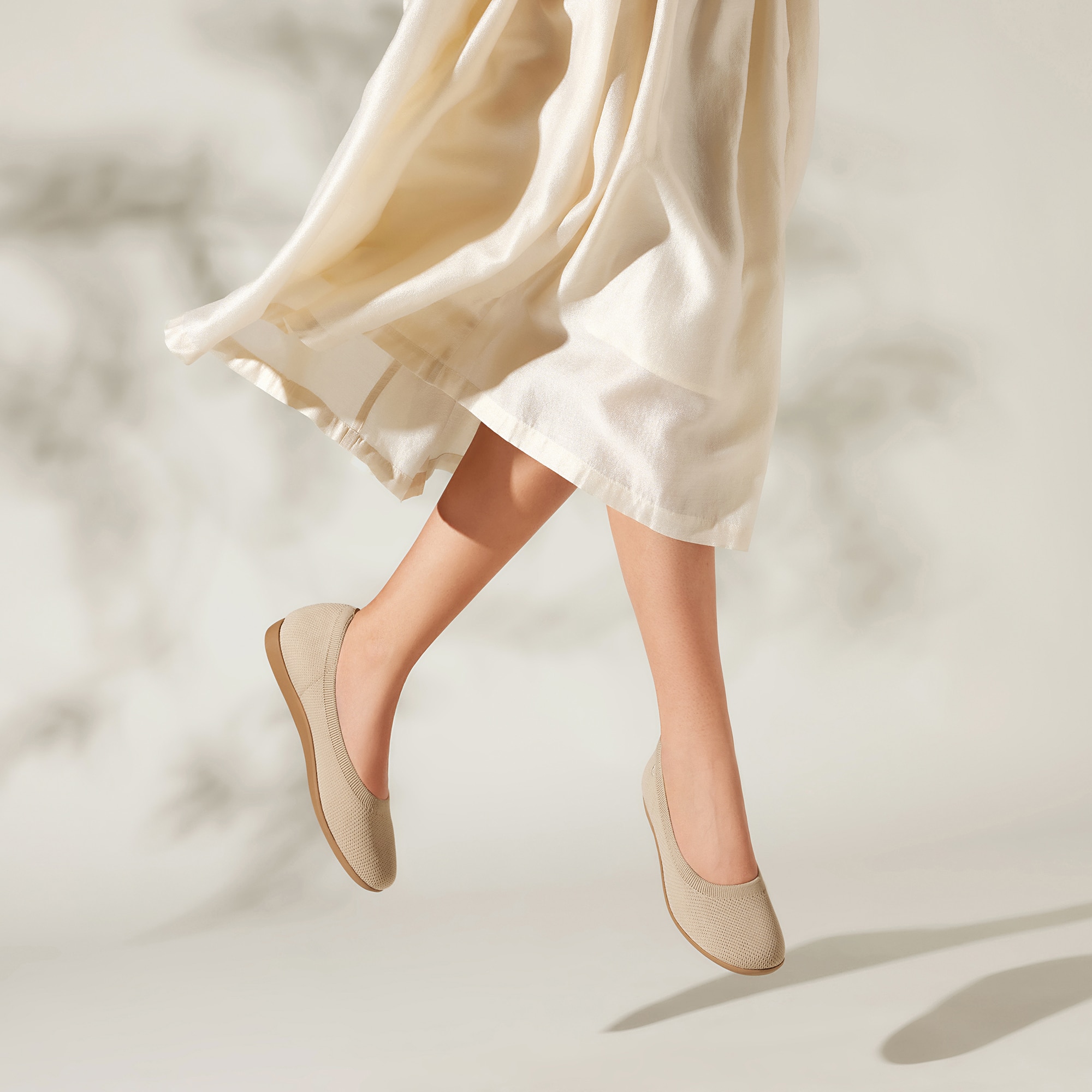 Claire Walker Round-Toe Flats in Almond | VIVAIA