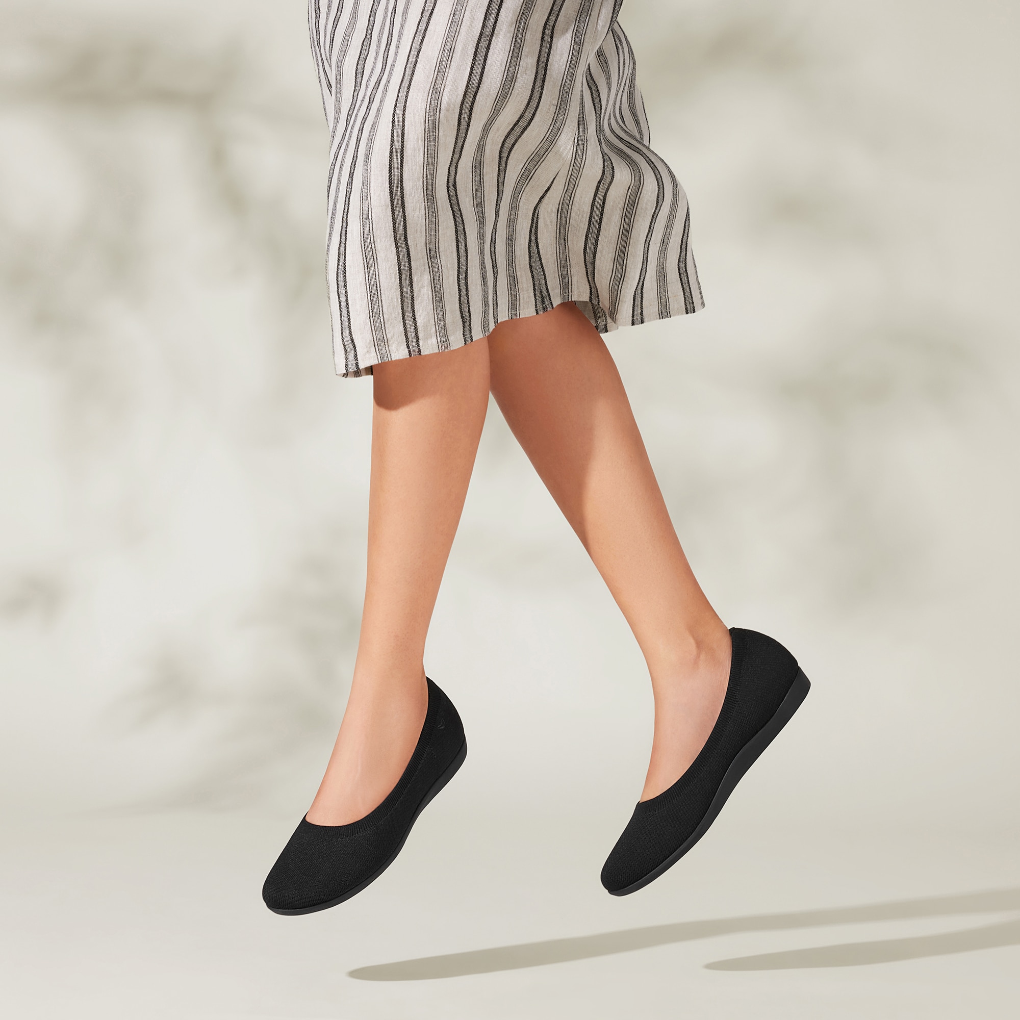Claire Walker Round-Toe Flats in Black | VIVAIA